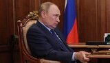 путін