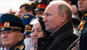путін