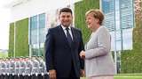меркель гройсман
