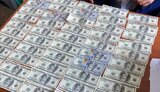 Следователю киевской полиции пытались дать 30 тыс. долл. взятки за закрытие дела. ФОТО
