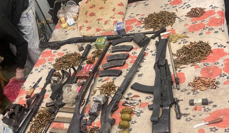 Задержан житель Киевщины: мужчина незаконно хранил пулемет и гранаты. ФОТОрепортаж