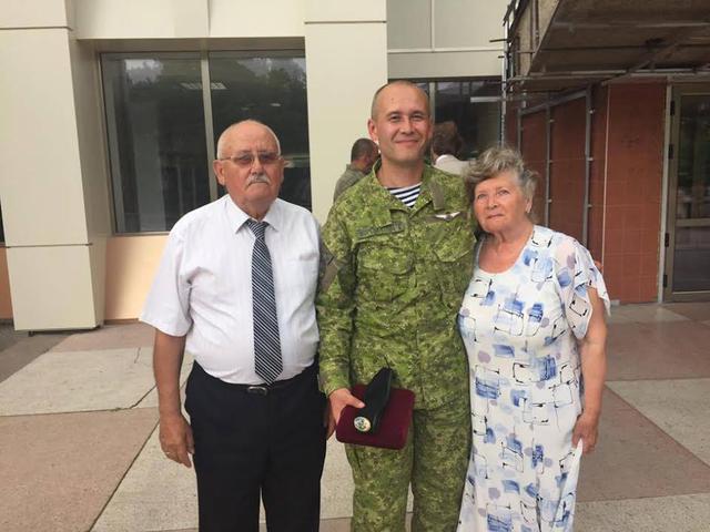 николаев герой народный награждение