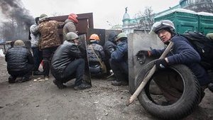 Громадянин США, мільйонер Марк Паславський 20 лютого 2014 року із шиною і щитом брав участь в штурмі разом із Небесною сотнею на вул. Інститутській. ФОТОрепортаж