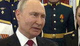 путін