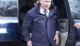 путін