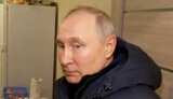 путін