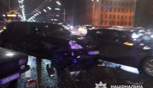 Drunk Porsche driver in Kyiv caused accident, hit passenger and used weapon, - police. PHOTO