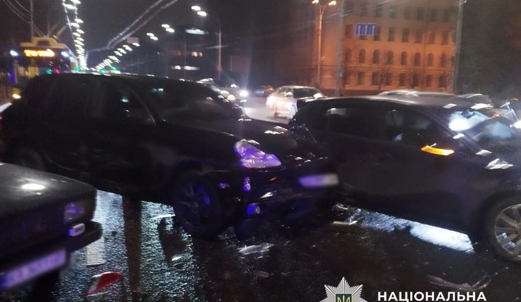 Drunk Porsche driver in Kyiv caused accident, hit passenger and used weapon, - police. PHOTO