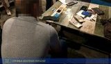 Слідчий поліції Харківщини погорів на хабарі в $2 тис. ФОТОрепортаж