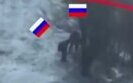 окупанти розглядають вибухонебезпечний предмет