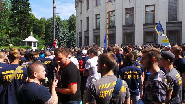 Protesters clash with police near Rada building 21