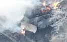 Russian jumps out of a burning tank