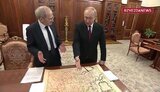 путін