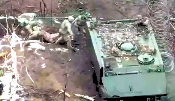 Medics of 63rd SMB evacuating four wounded soldiers from their position. VIDEO