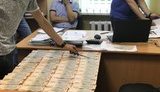Під час одержання відкату за ремонт школи затримано заступника начальника управління освіти Краматорської міськради, - прокуратура. ФОТО