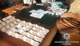 На хабарах у Дніпропетровській області затримано шістьох осіб, - Нацполіція. ФОТОрепортаж