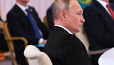путін