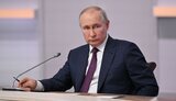 путін