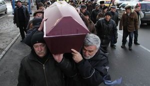 "Власть на гиляку": чернобыльцы с гробом провели марш в Донецке. ФОТОрепортаж