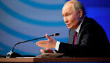 путін