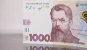 тисяча