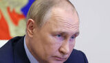 путін