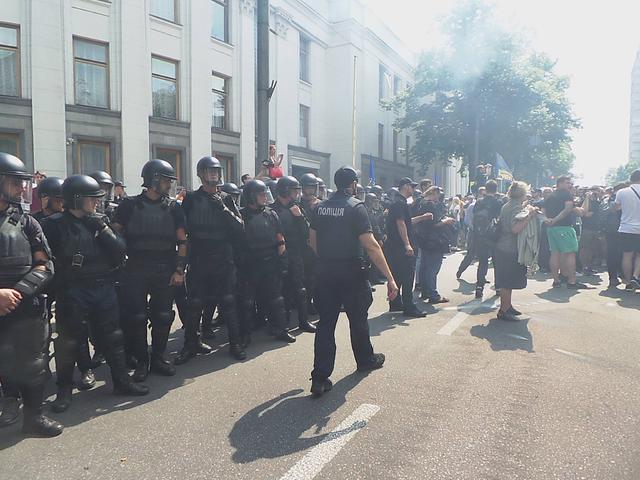 Protesters clash with police near Rada building 11