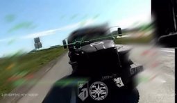 безпілотник атакує російську військову вантажівку