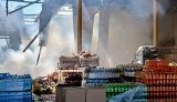 Russian forces strike Pavlohrad: warehouses belonging to logistics companies and shop are on fire, two fatalities. PHOTO