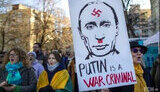 путін