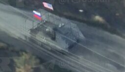 оккупанты установили на бронемашине флаг США
