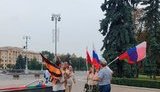 Люди з російськими та "георгіївськими" прапорами прибули до Мінська з РФ. ФОТО