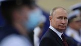путін