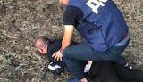 Поліція в Харкові затримала двох братів, які вимагали з підприємця $15 тис. "боргу". ФОТОрепортаж