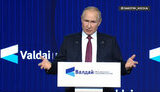 путін