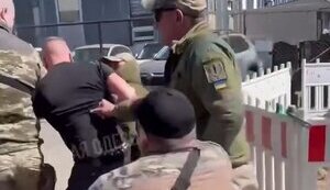 In Odesa, men in military uniforms beat man, pull him out of bus and shove him into minibus. VIDEO