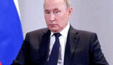 путін
