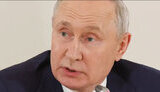 путін
