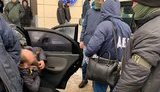 Прикордонника зі спільником затримано на хабарі $1 250 за сприяння в легалізації іноземців, - ДБР. ФОТО