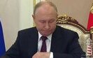 путін