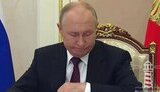 путін