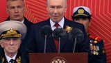 путін