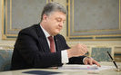 Poroshenko signs into law bill prohibiting bringing firearms to parliament, government