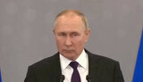 путін