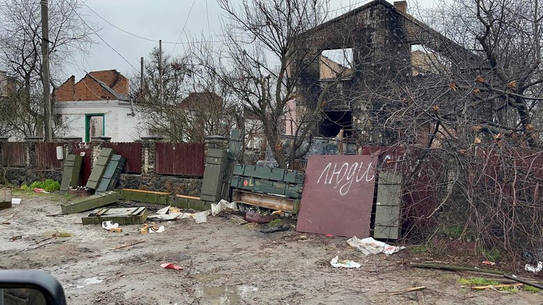 Andriivka after Russian occupation: Full tin with pile of ammunition 05
