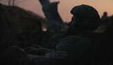 Ukrainian soldier in trench in Kharkiv region