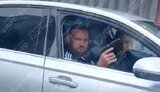 Audi passenger decides to fire gun