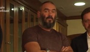 Участника нападения на журналистов "Схем" Тельбизова встретили овациями в "Укрэксимбанке" после возобновления в должности. ВИДЕО