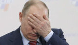 путін