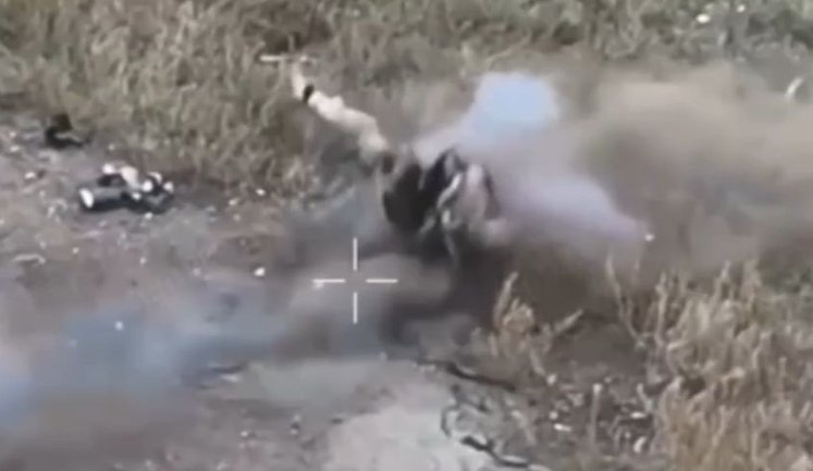 Suicidal occupier thrown into air and hit to ground by grenade planted under his bulletproof vest. VIDEO